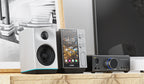 FiiO R9 music streamer with sleek black design, multiple ports, and digital display for high-quality audio streaming.