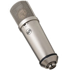 Warm Audio WA-87jr condenser microphone with nickel finish, shown from an angled side view highlighting its sleek design.