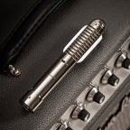 Warm Audio Fen-tone ribbon microphone shown from the side with its vintage-inspired design and grille details.