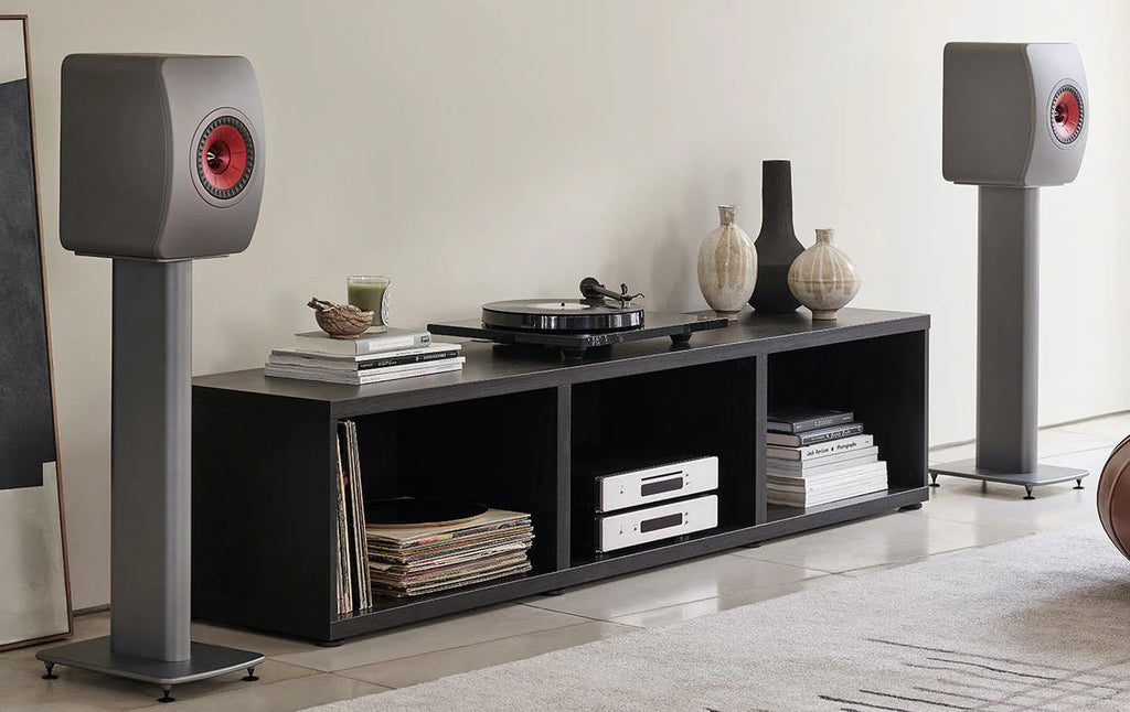 KEF LS50 Wireless II wireless speakers with sleek black finish and modern design, showcasing their compact size and high-quality build