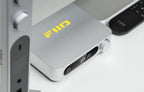 FiiO SR11 music streamer device with sleek black design and control buttons, designed for high-quality audio streaming.