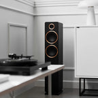 Argon Audio Fenris A55 floorstanding speakers in black with sleek wooden finish, tall design, and multiple speaker drivers.
