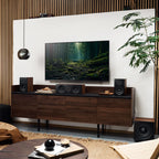 Argon Audio Forus Center speaker with sleek black design, showcasing its front grille and compact form for home theater setups.