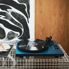 Black Argon Audio TT MK2 turntable with tonearm and platter, showcasing sleek design and controls for high-quality vinyl listening.