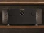 Marantz AV 20 stereo amplifier with sleek design and control knobs, showcasing high-quality audio equipment for home audio systems.