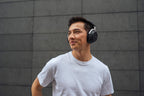 Wireless Beyerdynamic Aventho 300 headphones with over-ear design and sleek black finish, shown from a side angle.