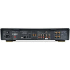 Arcam A5+ stereo amplifier showing front panel with control knobs and display screen, black metal casing, and input ports.