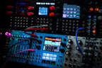 1010music Bluebox Eurorack modular synthesizer with colorful knobs and patch points, designed for versatile sound creation.