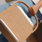 Bang & Olufsen Beosound A5 portable speaker with sleek design and fabric covering, ideal for high-quality sound in stylish home setups