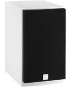 DALI Menuet passive bookshelf speakers with white grilles, compact design and modern audio equipment appearance.