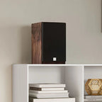 DALI Menuet SE passive bookshelf speakers with wild walnut finish, ideal for stylish home audio setups.