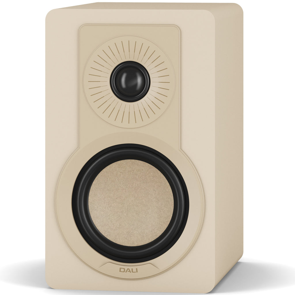 DALI Kupid passive bookshelf speakers with caramel white grille, showcasing sleek design and compact size for home audio.