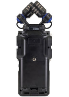 Zoom H6 studio digital recorder with multiple input jacks, LCD screen, and built-in controls for professional audio recording.