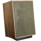 Klipsch Heresy IV floorstanding speaker with American Walnut finish and right grille detail, showcasing high-quality audio design.