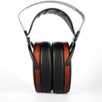 HiFiMAN Arya Organic wired headphones with open-back design and plush ear cushions, showcasing high-fidelity audio quality.