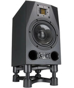 White IsoAcoustics ISO-200 studio monitor stands with Adam A7X speakers on top, designed for optimal sound isolation and stability.