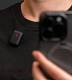 Instamic Pro Plus C portable recorder with microphone, compact design, and streaming capabilities, shown in a close-up image.