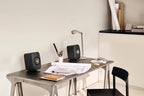 KEF P1 Desk Pad speaker stands, lifestyle