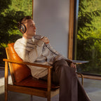 Wired Meze Audio 105 SILVA headphones with black ear cups and headband, featuring sleek design and padded ear cushions.