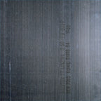 Black vinyl LP cover of New Order's Brotherhood album, featuring the band's artwork and album title in bold text.