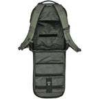 Wandrd Prvke Zip video equipment bag with green exterior and divider, designed for safe, organized storage of camera gear.