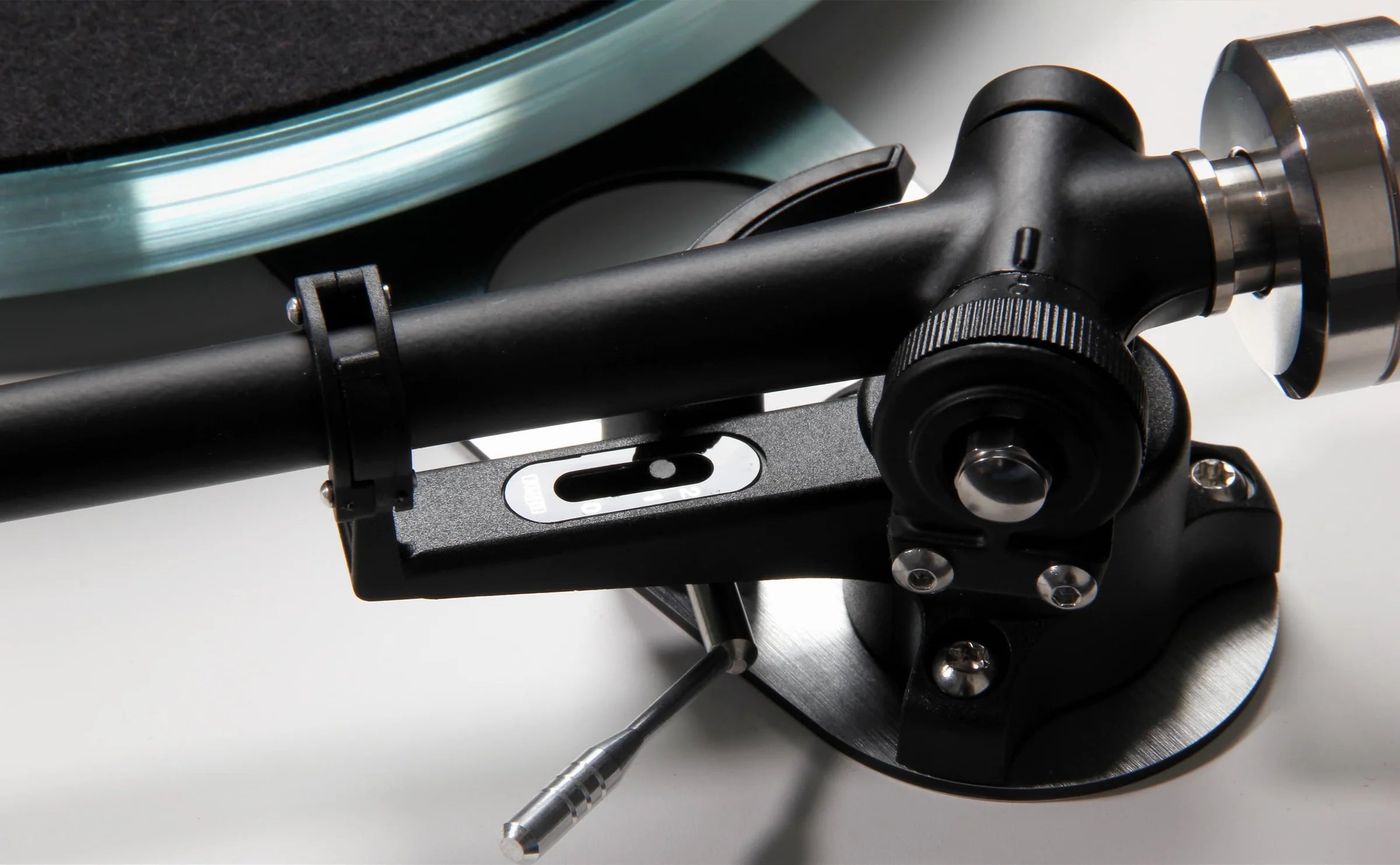 Rega Planar 6 turntable with Polaris Grey finish and Nd5 cartridge, showcasing the sleek design and tonearm details.