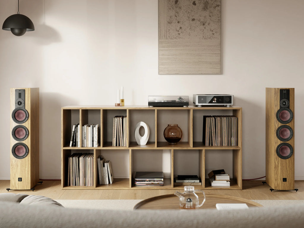 DALI Rubikore 8 passive floorstanding speaker with sleek black finish and modern design, shown in a stylish home audio setup.