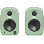 Kanto Audio UKI desktop speakers with sleek black finish, featuring front-facing drivers and modern design for high-quality sound.