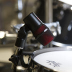 SE Electronics V BEAT dynamic microphone shown with its sleek black design and sturdy build, ideal for professional audio recording.