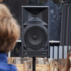AlphaTheta Wave-Eight battery-powered loudspeakers with sleek design and control panel, suitable for portable audio needs.