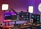 Elgato Facecam MK2 video camera mounted on a desk with a laptop and microphone, used for streaming and content creation.