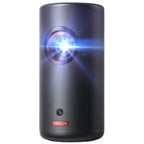Nebula Capsule 3 Laser projector displaying a vibrant image on a wall, compact design, black color, portable home entertainment device.