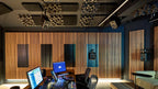 Adam Audio S2V mid-field main studio monitors shown in a professional studio setting with sleek black cabinets and detailed drivers.