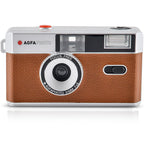 AgfaPhoto Reusable Compact Camera for instant photos, black plastic body with silver accents, ready for film photography.