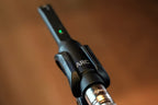 IK Multimedia ARC X room calibration software with measurement microphone, used for acoustic room analysis and calibration.
