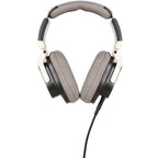 Austrian Audio The Arranger wired headphones with over-ear design, black ear cups, and adjustable headband on a plain background.