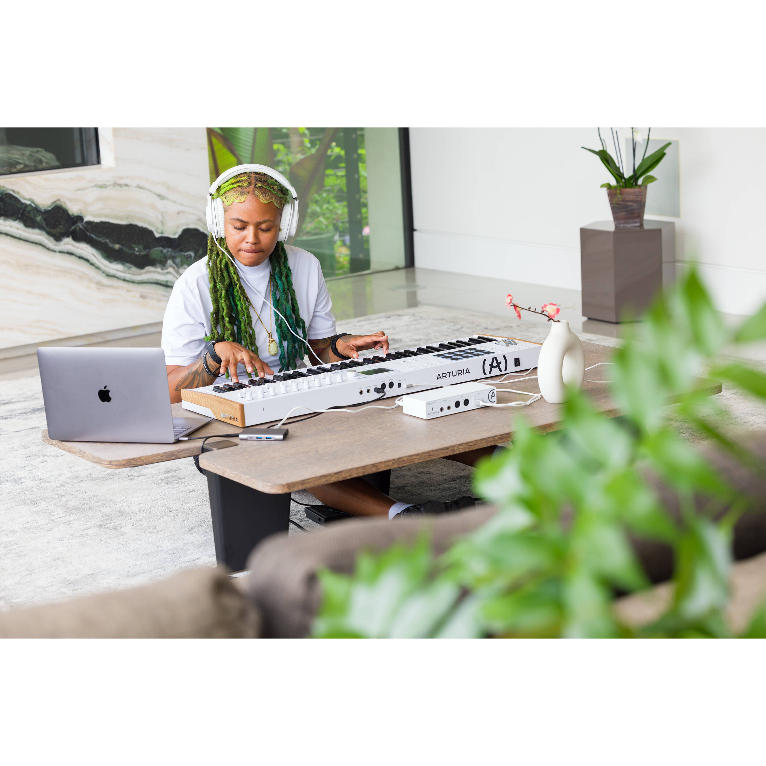 Arturia KeyLab 61 MK3 MIDI keyboard with 61 keys, control knobs, and pads for music production and digital performance.