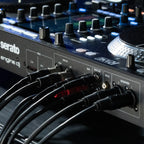Rane System One DJ controller with jog wheels, mixer controls, and connectivity options for professional DJ setups.