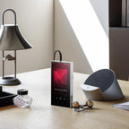 Astell&Kern PD10 portable music player with sleek black design and touchscreen display, showing music interface on the screen.