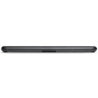 Black Bluesound Pulse Cinema soundbar with rear speakers on a tabletop, showcasing a sleek home theater setup.