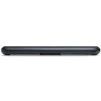 Black Bluesound Pulse Cinema Mini soundbar on a tabletop, rear view showing connection ports and sleek design.