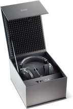 Focal Elear high-fidelity headphones with sleek design, displayed inside a decorative box, showcasing premium audio quality.