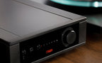 Rega Brio MK7 phono preamp with sleek design and control knobs, showcasing high-quality audio equipment for vinyl playback.