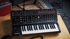 Sequential Pro 3 synthesizer with multiple knobs and controls, displayed on a black background, showcasing its professional interface.