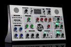 Erica Synths Bullfrog XL desktop synthesizer with multiple knobs, patch points, and a compact black design.