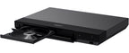 Sony UBP-X700 CD player with sleek black design and front-loading disc tray, showcasing modern entertainment technology.