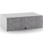 DALI Rubikore Cinema center speaker with high-gloss white finish, showcasing sleek design and front grille for high-quality audio.