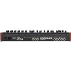 Sequential Prophet Rev2-16 Desktop synthesizer with multiple knobs and buttons, compact design, and digital display.