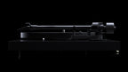 Side view of Pro-Ject Debut Pro S turntable in satin black, showcasing its sleek design and high-quality build.
