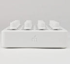 DJ TechTools MIDI Fighter Twister MIDI controller, white front view